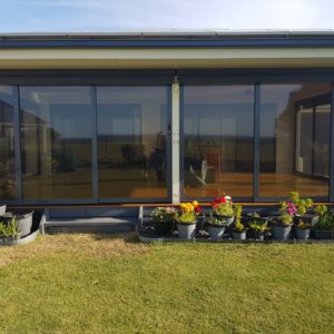 Charcoal Tinted Multi-Stack Sliding Screen Doors