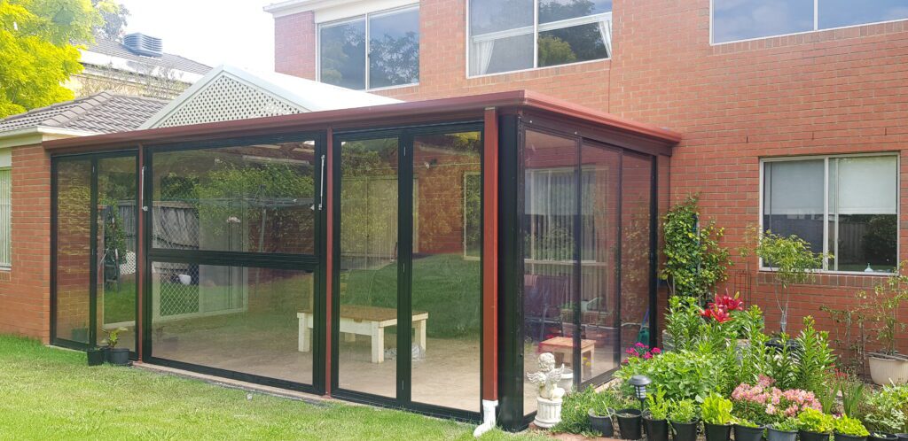PVC Bi-Fold Screens Installed on Modern Deck