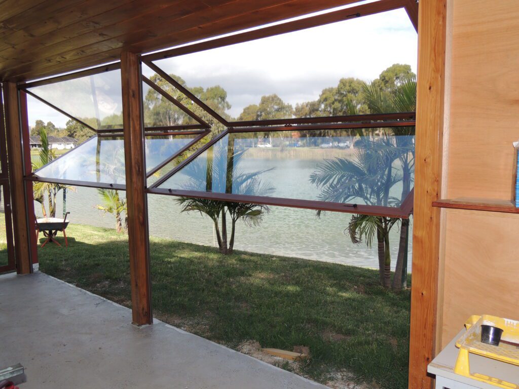 Outdoor Room with Clear Panels and Roof Covering