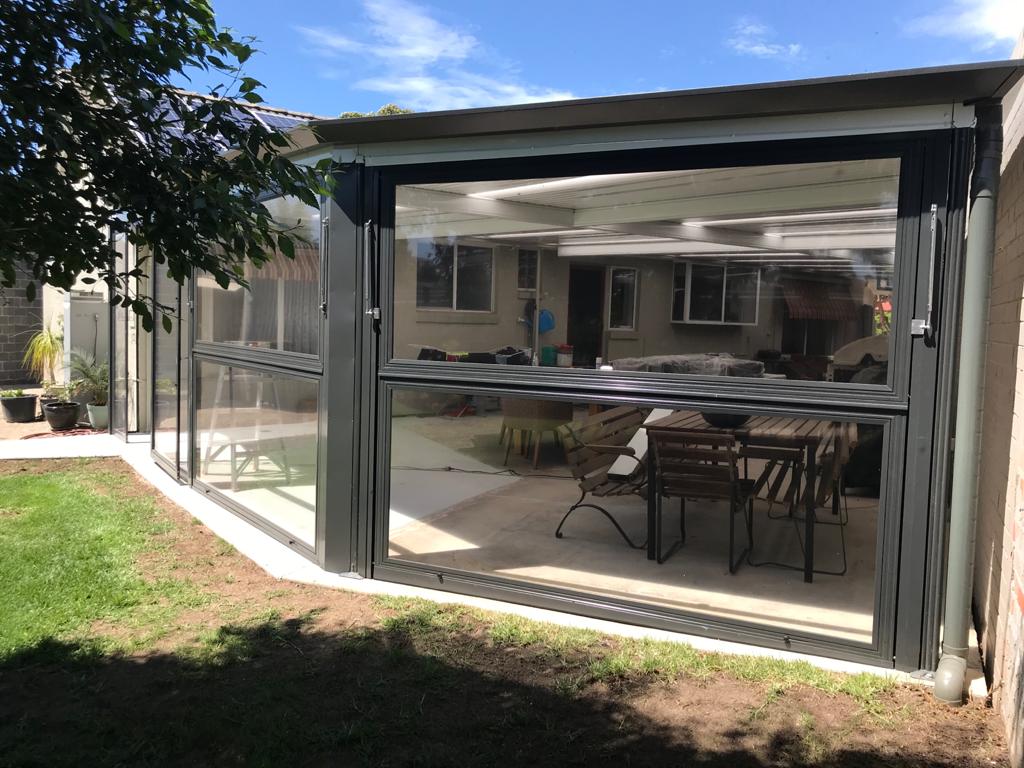 Glass Panel Installation in Covered Outdoor Space